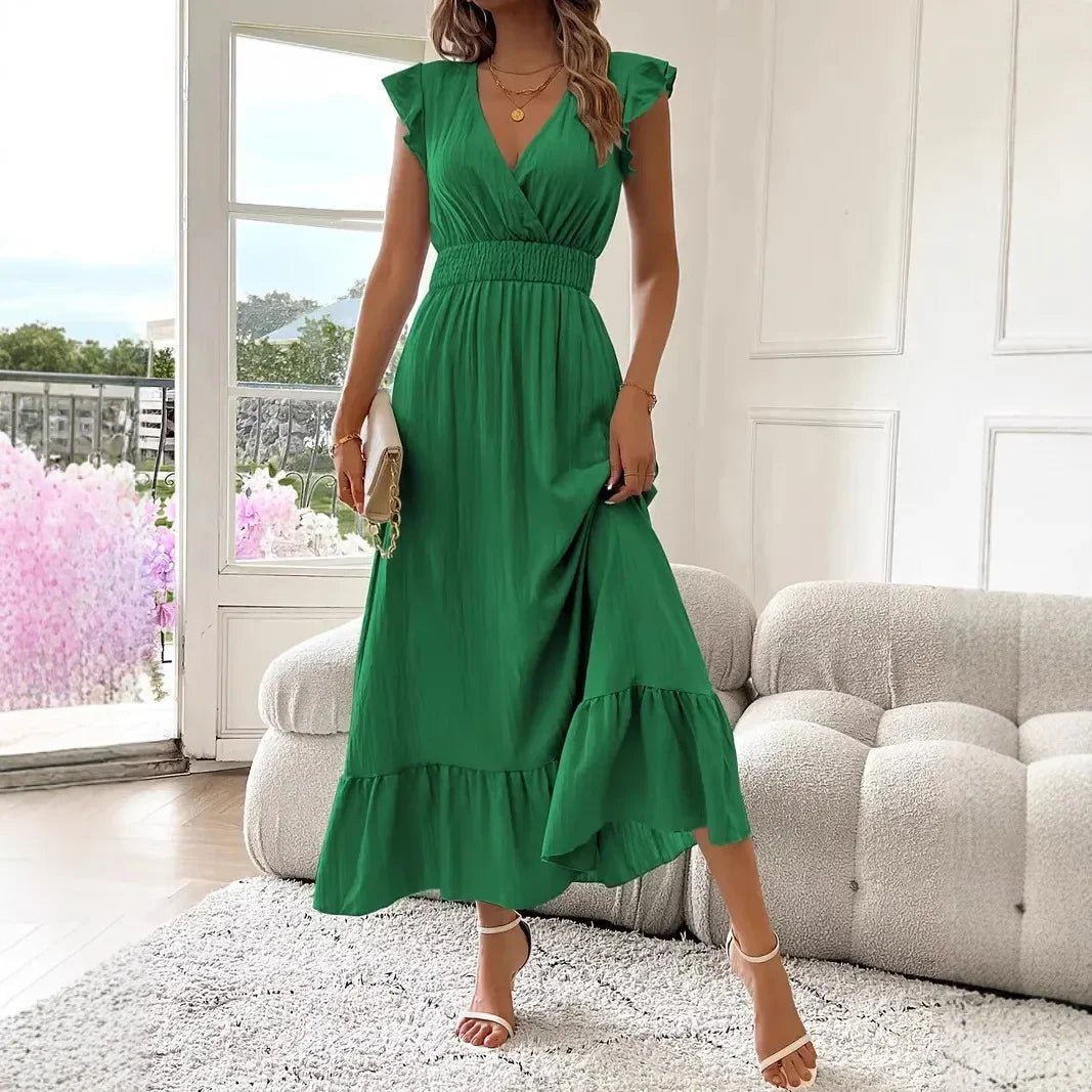 Μαύρο φόρεμα Livia σε γραμμή swing με λαιμόκοψη V και βολάν