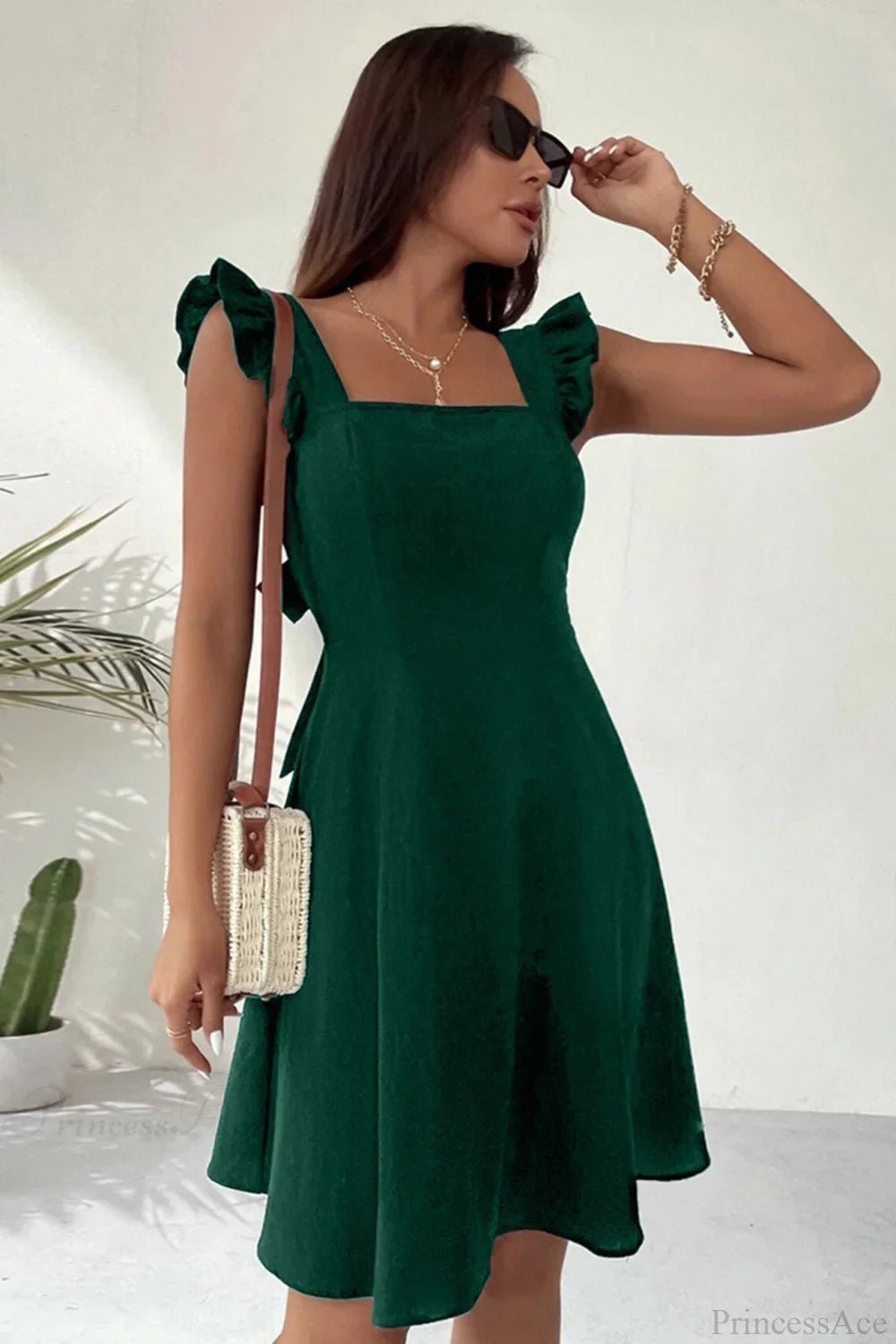 Nora Sleeveless Mini Dress with Ruffle Tie-back