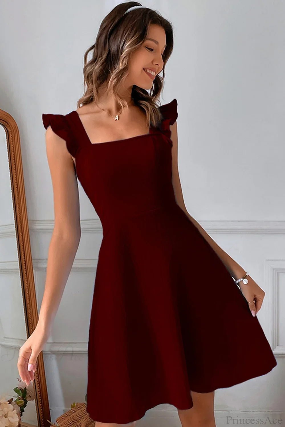 Nora Sleeveless Mini Dress with Ruffle Tie-back